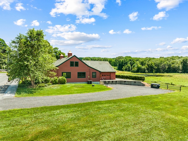 view of front of home featuring a front lawn