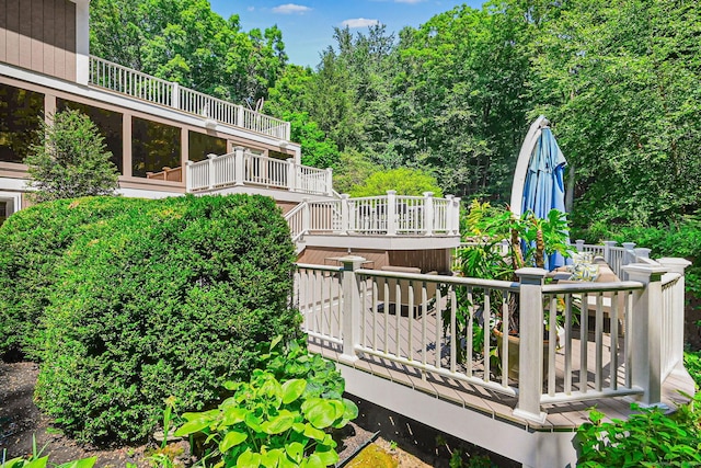 view of home's community featuring a wooden deck