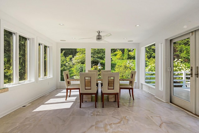 sunroom with plenty of natural light