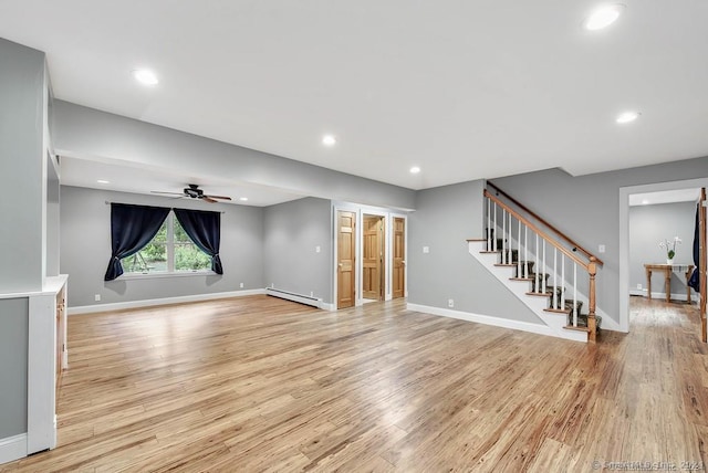 unfurnished living room featuring light hardwood / wood-style flooring, baseboard heating, and ceiling fan