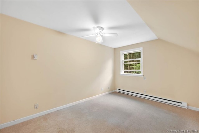 bonus room with baseboard heating, ceiling fan, light carpet, and vaulted ceiling