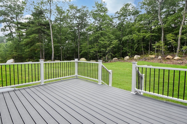 wooden terrace with a yard