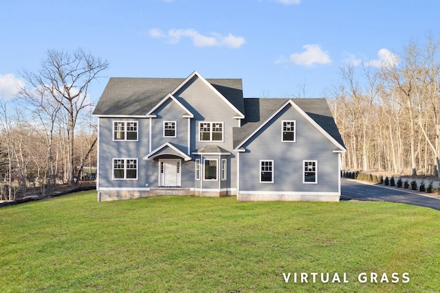 view of front of property with a front lawn