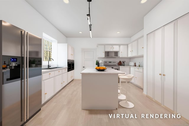 kitchen with a center island, electric range oven, white cabinetry, and high quality fridge