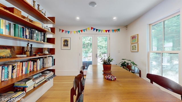 dining area featuring light wood-type flooring