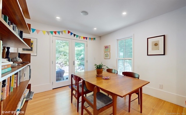 dining room with light wood-type flooring