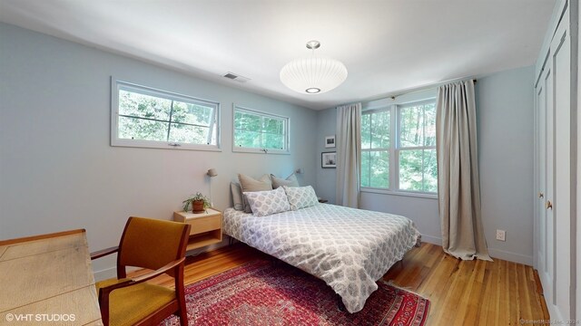 bedroom featuring wood-type flooring