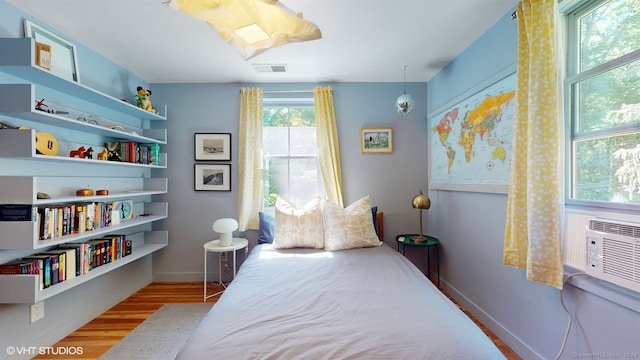 bedroom featuring light hardwood / wood-style flooring