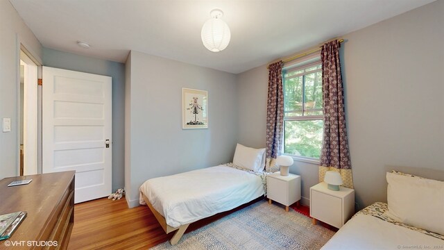 bedroom featuring hardwood / wood-style flooring