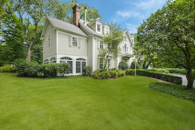 view of front of house featuring a front yard