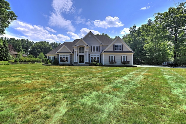 view of front facade with a front yard