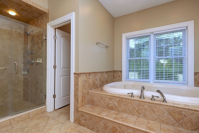 bathroom with plus walk in shower and tile patterned floors