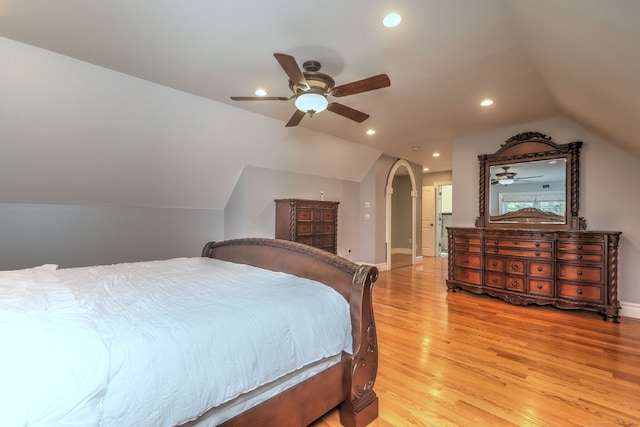 bedroom featuring vaulted ceiling, ceiling fan, and light hardwood / wood-style floors