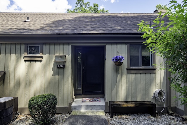 doorway to property with central AC