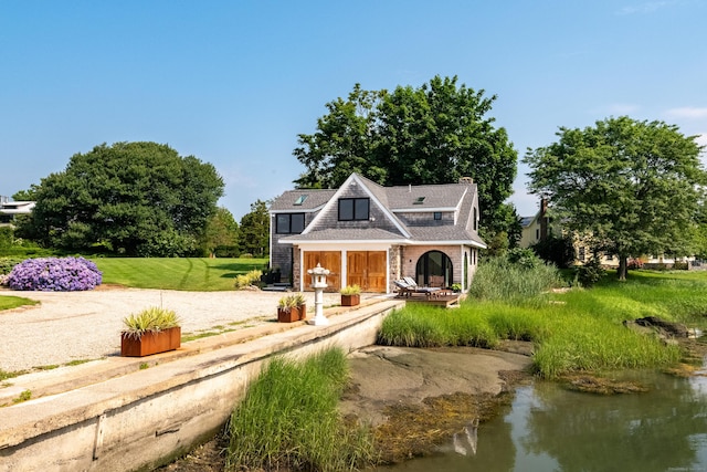 215 Uncas Point Rd, Guilford, CT 06437 - shingle-style home featuring a chimney and a water view