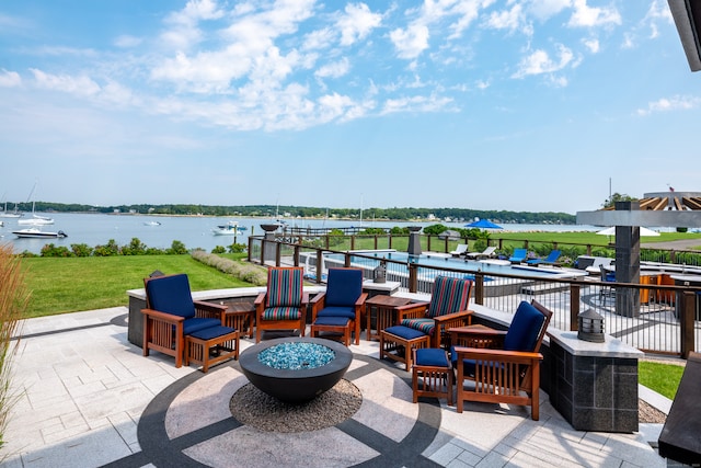 view of patio / terrace featuring a water view