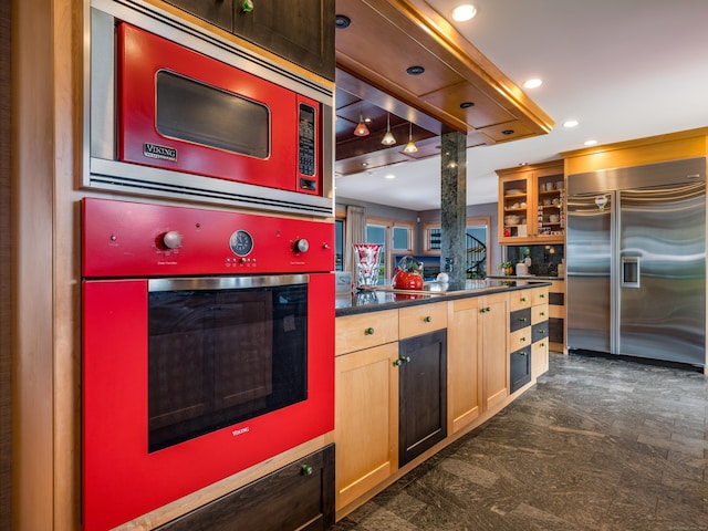 215 Uncas Point Rd, Guilford, CT 06437 - kitchen with stainless steel appliances, dark countertops, glass insert cabinets, and recessed lighting