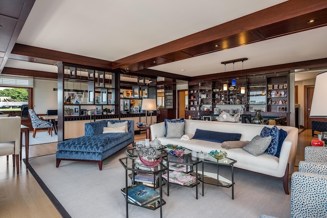 215 Uncas Point Rd, Guilford, CT 06437 - living room featuring wood finished floors and beamed ceiling