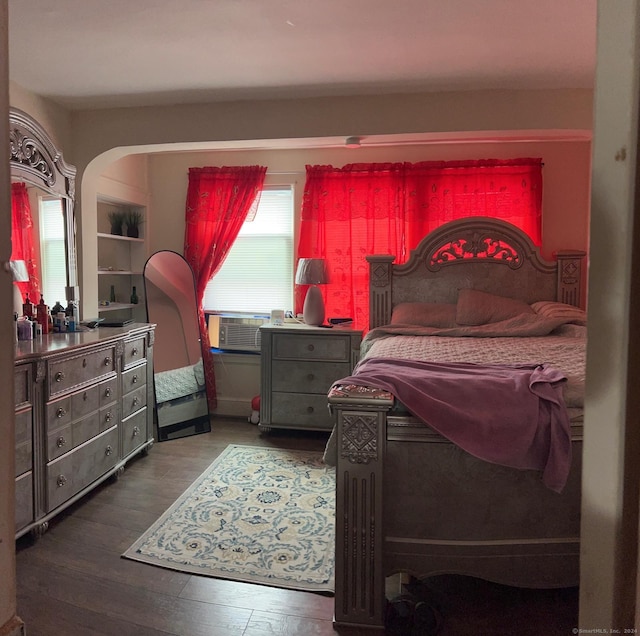 bedroom featuring cooling unit and hardwood / wood-style flooring