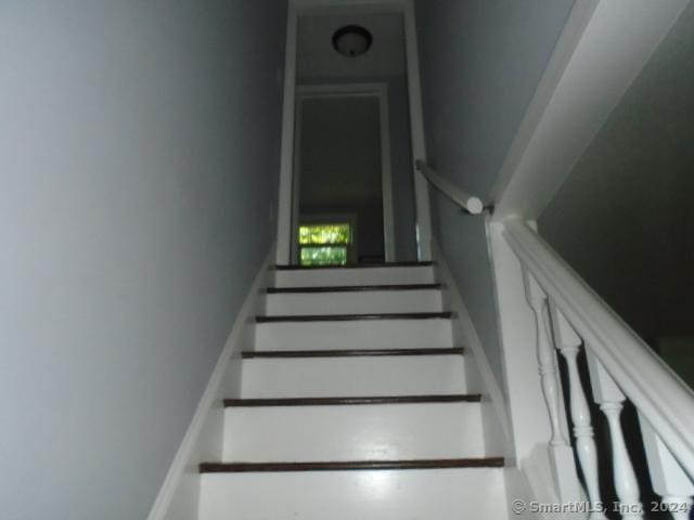 stairway with baseboards