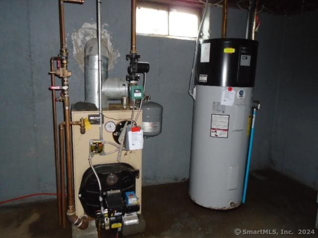 utility room with water heater