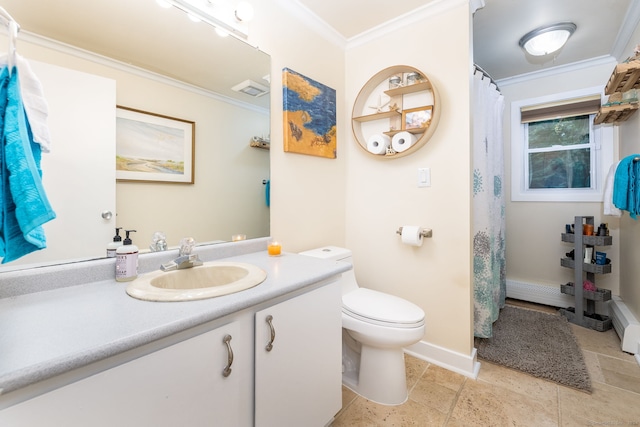 bathroom with crown molding, vanity, and toilet