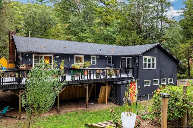 rear view of property with a deck