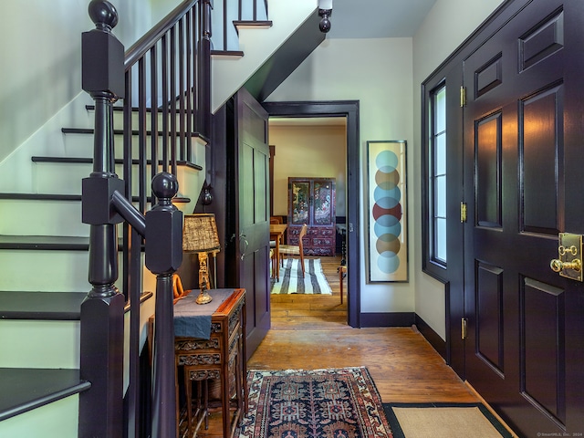 entrance foyer with hardwood / wood-style floors