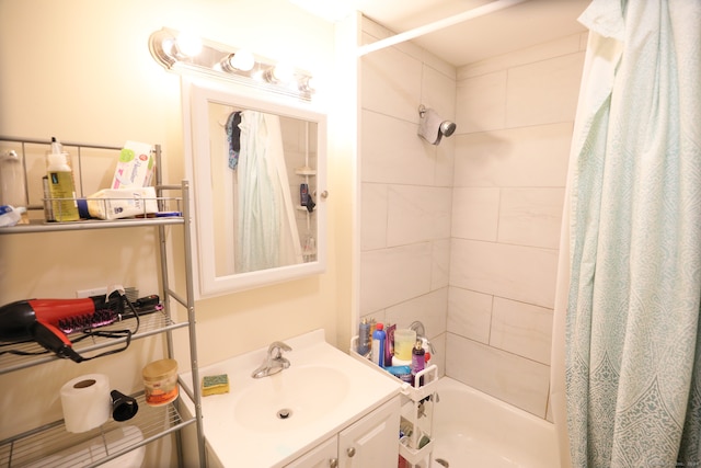 bathroom with vanity and shower / bath combination with curtain