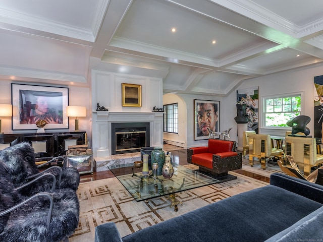 living room with crown molding, coffered ceiling, a fireplace, a baseboard radiator, and beamed ceiling