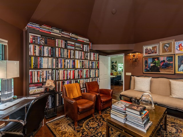 office featuring wood-type flooring and vaulted ceiling