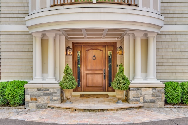 property entrance with a balcony