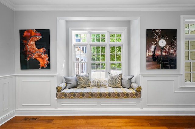 mudroom featuring hardwood / wood-style floors and crown molding