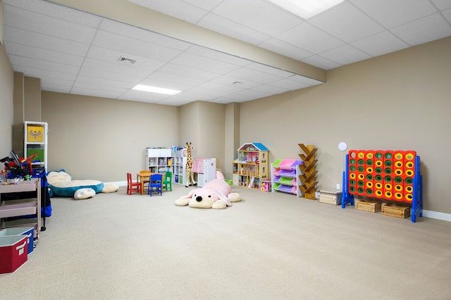 game room featuring a paneled ceiling and carpet floors