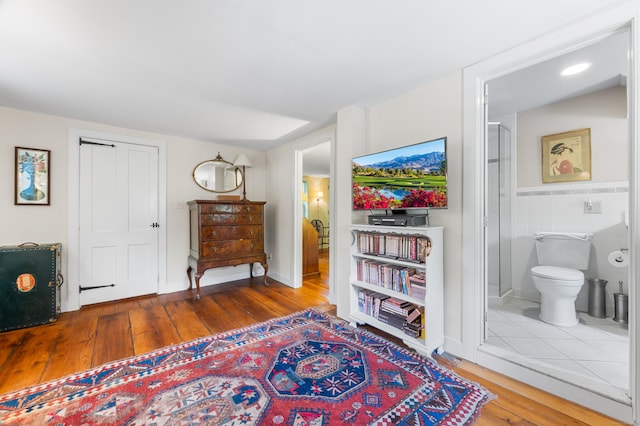 28 S Wig Hill Rd, Chester, CT 06412 - sitting room with hardwood / wood-style flooring and tile walls