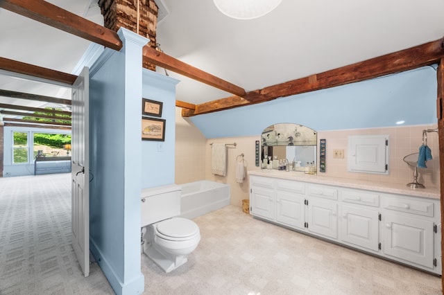 bathroom with vanity, toilet, lofted ceiling with beams, and a bath