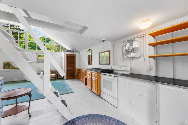 kitchen with lofted ceiling, light hardwood / wood-style floors, and white electric stove