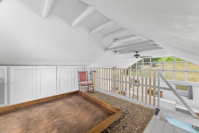 bonus room with vaulted ceiling with beams and ceiling fan