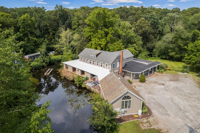 bird's eye view with a water view