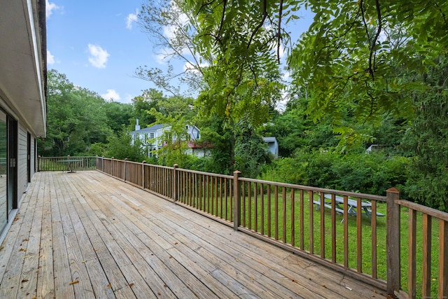 deck featuring a yard