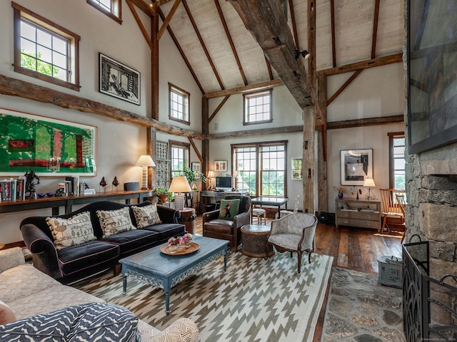 living room featuring a fireplace, high vaulted ceiling, wood-type flooring, wood ceiling, and beam ceiling