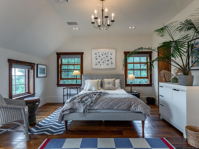 bedroom featuring an inviting chandelier, vaulted ceiling, and dark hardwood / wood-style floors