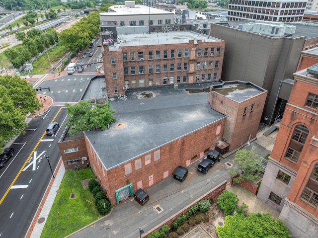 birds eye view of property featuring a city view