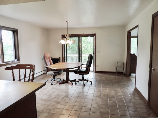 181 Scotland Rd, Sprague, CT 06330 - dining area with healthy amount of natural light, a chandelier, and a baseboard heating unit