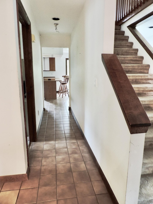 181 Scotland Rd, Sprague, CT 06330 - corridor featuring dark tile patterned flooring and baseboards