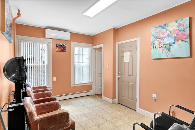 sitting room featuring light tile patterned floors, baseboards, baseboard heating, and an AC wall unit