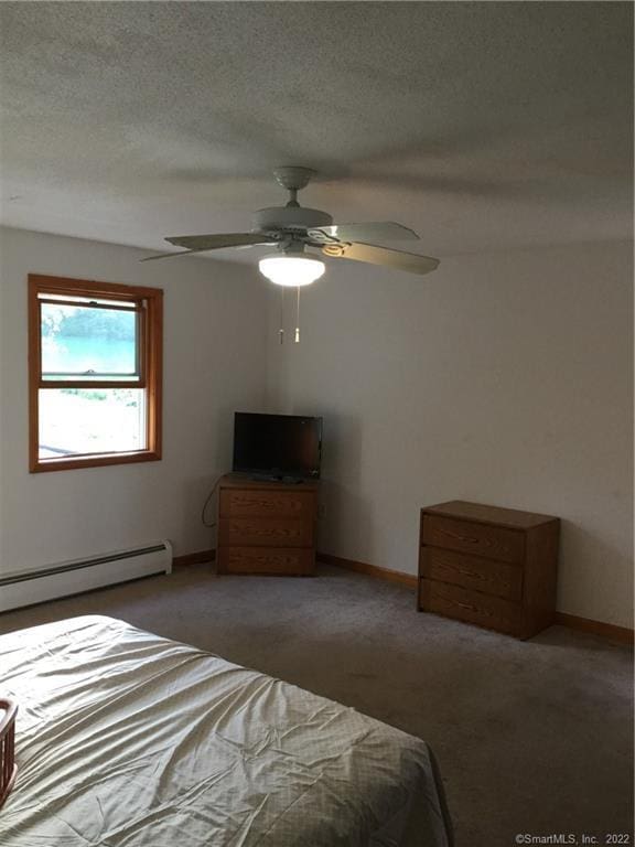 1 Neiderwerfer Rd, East Windsor, CT 06016 - bedroom with baseboard heating, light colored carpet, ceiling fan, and a textured ceiling