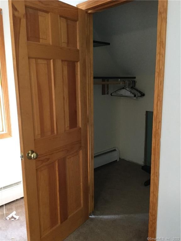 closet with baseboard heating