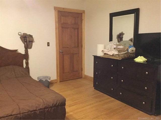 bedroom featuring light wood-type flooring