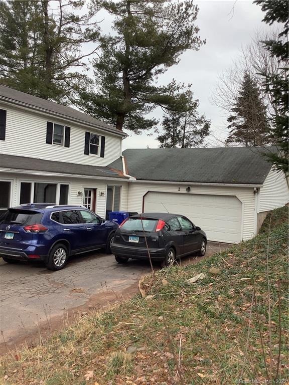 front of property featuring a garage